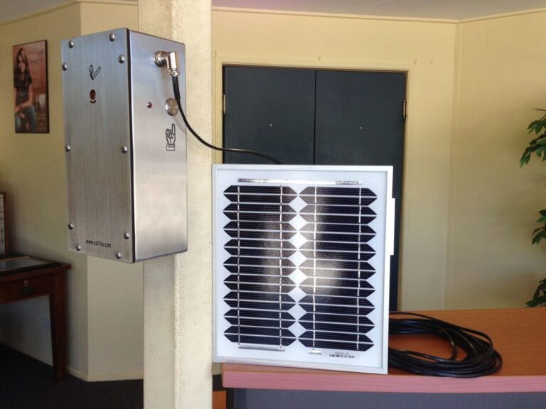 Wall-mounted Ozilite ACLBPS automatic cigarette lighter with connected solar panel