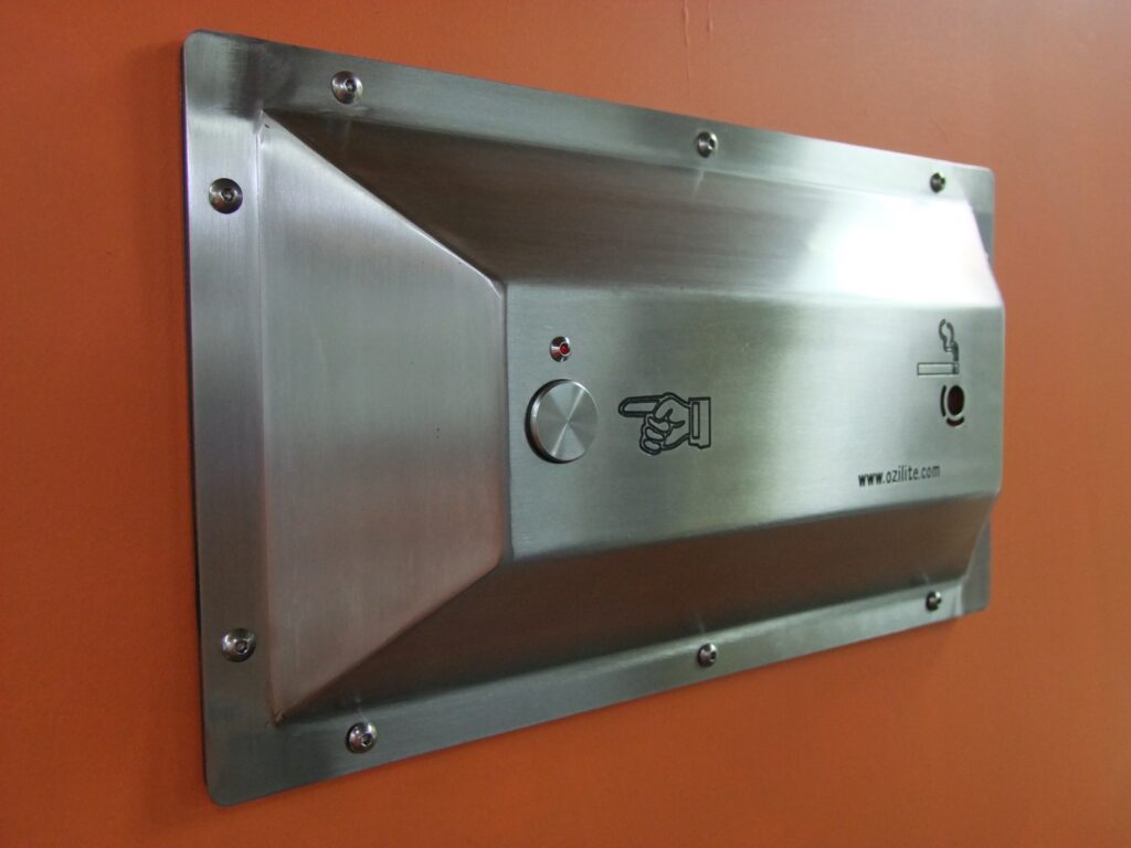 Ozilite ACL WMT wall-mounted automatic flameless cigarette lighter, left-hand angled view