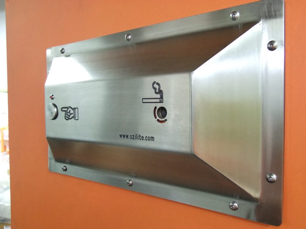 Ozilite ACL WMT wall-mounted automatic flameless cigarette lighter, right-hand angled view